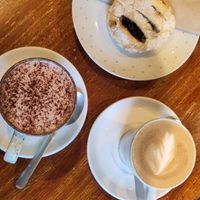 Hot drinks and vegan pastry at The Snug  in Christchurch