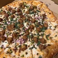 Vegan butter chicken pizzaa  at Apna Pizza in Rockville