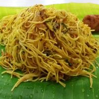 Fried noodles served on a banana leaf at Malayan Cafe. at Malayan Cafe in Jaffna