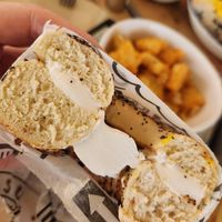 Everything bagel with tofu schmear at LGA - Poppy's Bagels - TC in Queens