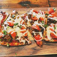 "Meat your heart out" vegan flatbread (made with vegan crustb& vegan mozzarella). at Grain & Berry in Fort Wayne