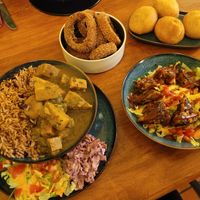 Vegetable Curry with Rice and Peas, Panko Onion Rings, Fried Dumplings and Vegan Jerk Bites at Hummingbird in Newtown