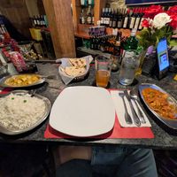 Vegan tofu coconut curry (spice level 3), vegan roti, and vegan mushroom masala (spice level 4). So good!  at Spice & Tonic - Indian Cuisine & Bar in Minneapolis