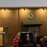 Rear entrance and parking  at Crumb & Spigot - Lakewood in Lakewood