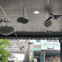 Water bottles turned into airplane decor ✈️ ☁️ at Grounded Chay - Plant Based Cuisine in Nha Trang