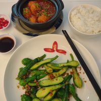 Tomato Tofu and Garlic fried baby pumpkin. Both great!!!!! at Grounded Chay - Plant Based Cuisine in Nha Trang
