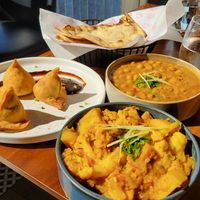 Aloo gobi, chana masala, roti, vegetarian samosa (it's actually vegan!) at India Rosa in Montreal