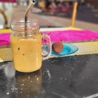 Flat white and chilli chocolate raw ball at Café Myka in Malmo