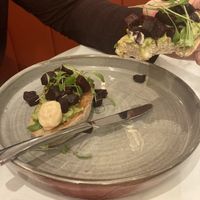 Avocado bruschetta on sourdough with sriracha vegan mayo  at Brasserie Artisan in Doncaster