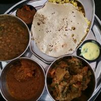 Indian vegan thali plate at Meshek Barzilay in Tel Aviv