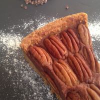 Pecan cake with coconut sorbet at Meshek Barzilay in Tel Aviv