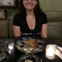 Pear pie and cocoa flake at Meshek Barzilay in Tel Aviv