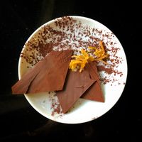 Simple dessert for chocolate lovers, super thin, melt in your mouth chocolate with the tiniest bit of lovely orange peel. at Meshek Barzilay in Tel Aviv
