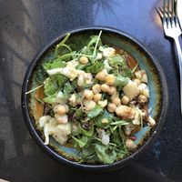 This roast cauliflower salad had many other ingredients which all melded together beautifully. at Meshek Barzilay in Tel Aviv