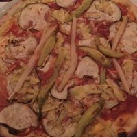 vegan pizza with tofu, eggplant, asparagus, and chili peppers at Pizzeria Foculus in Ljubljana