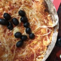 Margherita with vegan cheese and extra olives at Pizzeria Foculus in Ljubljana