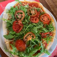 Summer pizza with vegan cheese at Pizzeria Foculus in Ljubljana