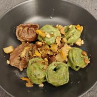 Tortelloni with mushrooms (brown ones) and with tofu, potatoes and spinach (green ones) at Je Suis Marisa in Modena
