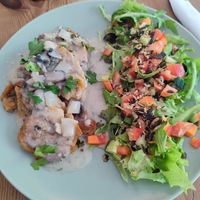 german dumplings with salad at Pele-Mele in Berlin
