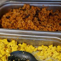 Eggs rice potatoes at Pele-Mele in Berlin