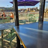 Outdoor seating at MAD Greens in Lone Tree