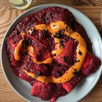 mushroom & tofu agnolotti in beet arrabiatta w/ chili sauce from Feral  at Feral in Portland