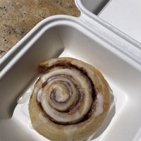 Cinnamon roll with fresh icing   at Coronats in Valencia