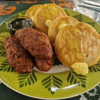 Delicious fluffy pancakes, syrup and bean sausages which were more like croquettes at Inity in Aburi
