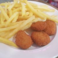 Chicken goujons, fries (comes with side of peas or beans) *VG* at Bella's Bar Bistro in South Shields