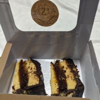 Two slices of vegan Jaffa cake cake  at Simply Patisserie in Eastbourne