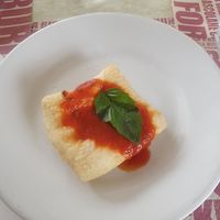 Starter (ask for no cheese) pizza puff with tomato sauce and basil at Zeus in Pompei