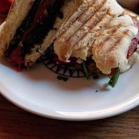 Vegan toasted bread with olive paste and ruccola at Lunatique in Kiel
