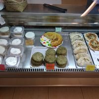 Savoury offer for lunch and whipped cream on the left at Vegetart Cuina Vegana in Barcelona