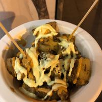 Patatas bravas con salsa allioli at Vegetart Cuina Vegana in Barcelona