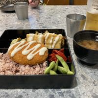 Terrible photo of the bento: there are veggies under that tofu, and a couple of gyoza  at Tokyo Maki - Melbourne in Melbourne