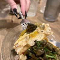 Vegan waffle with grilled eggplants, bell peppers, hummus and cilantro
 at Cafe Emigrant — Էմիգրանտ in Yerevan