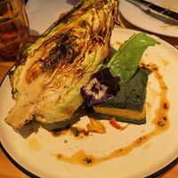 Grilled cabbage with tofu/almond paste and polenta/Spinach cakes  #Veganuary at Rasoterra in Barcelona
