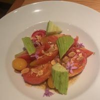 Tomato salad with cucumber and roasted almonds   at Rasoterra in Barcelona