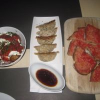 Vegan tapas:  patatas, gyoza, tomato bread at Rasoterra in Barcelona