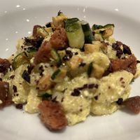 CAVATELLI (fresh pasta) with creamy courgette and yellow pepper sauce, Kalamata olives and croutons  at Rasoterra in Barcelona