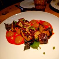 Homemade almond TEMPEH, baked red pepper, pickled and grilled nectarine, Belltall garlic sprout,
preserved lemon, shiso (gf) at Rasoterra in Barcelona