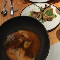 Parmentier de patata y caldo de setas / pan de ajo de oso at Rasoterra in Barcelona