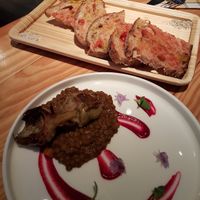 lentils dish and bread with tomatoes and salt at Rasoterra in Barcelona