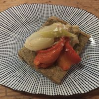 Second dish: chickpea farinata with marinated vegetables at Rasoterra in Barcelona