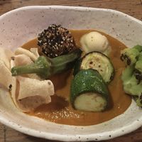 Third dish: curry with glutinous rice, papadum and veggies at Rasoterra in Barcelona
