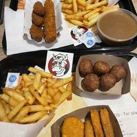 Fries, chicken nuggets, other chicken stuff, falafel balls and a typical Belgian sauce  at Pepas Vegan Frituur in Leuven