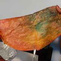 Tie-dye tortilla that was part of a Meow Wolf promo. at Illegal Petes - Park Hill in Denver