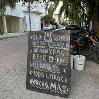 Sign out front - this is just across from  at La Vieja Escuela in Playa Del Carmen