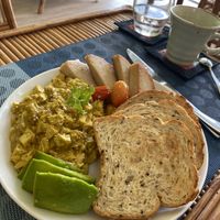 Scrambled tofu with toast  at Cambodhi in Kampot