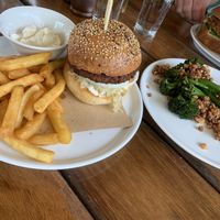 Vegan burger, chips and charred Brocolini with macadamia   at Brouhaha in Maleny